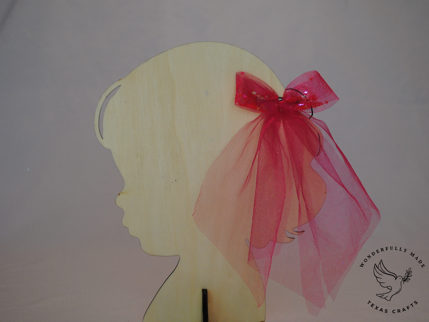 Pink filled tulle bow