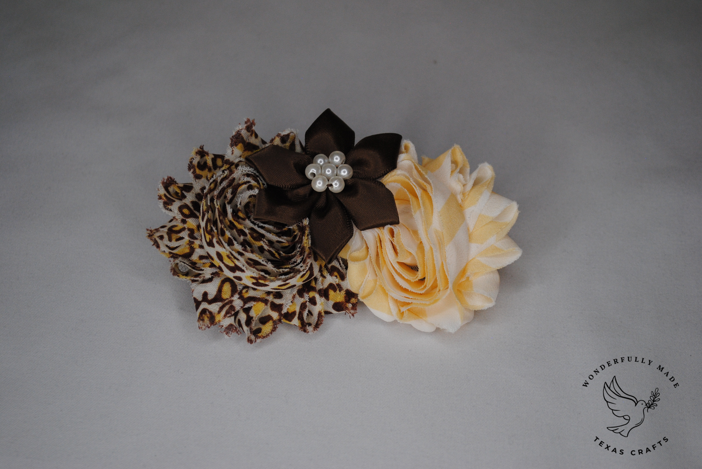 Leopard print, brown and cream flower clip