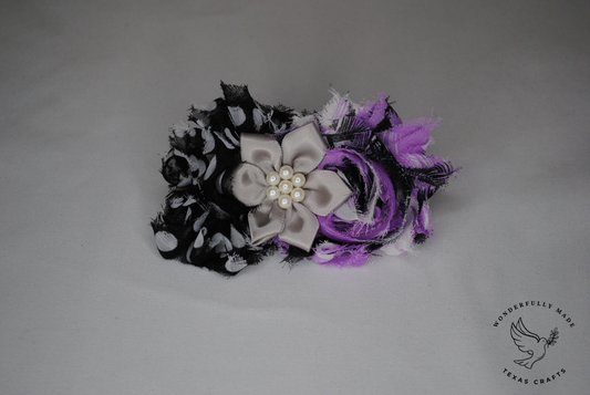 Purple and black flower clip