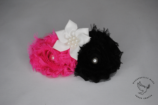 Black and pink flower clip
