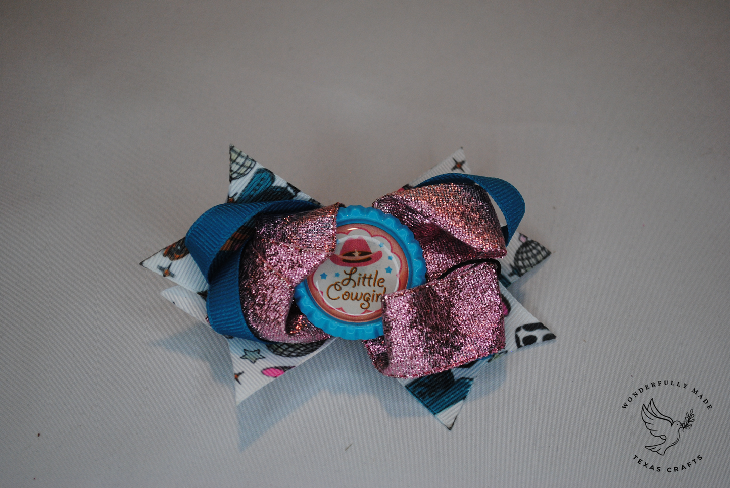 Turquoise Cow Print mini bow